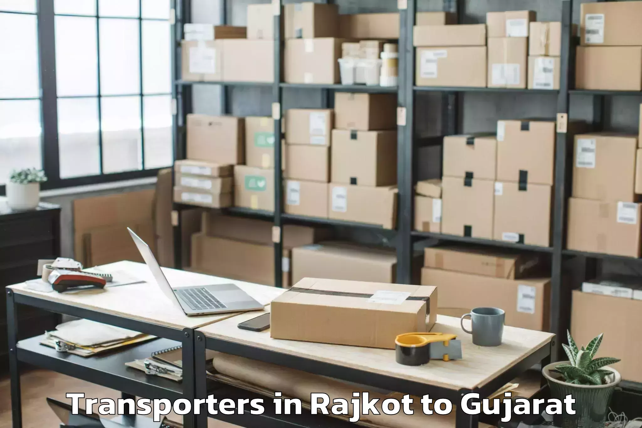 Top Rajkot to Abhilashi University Surat Transporters Available